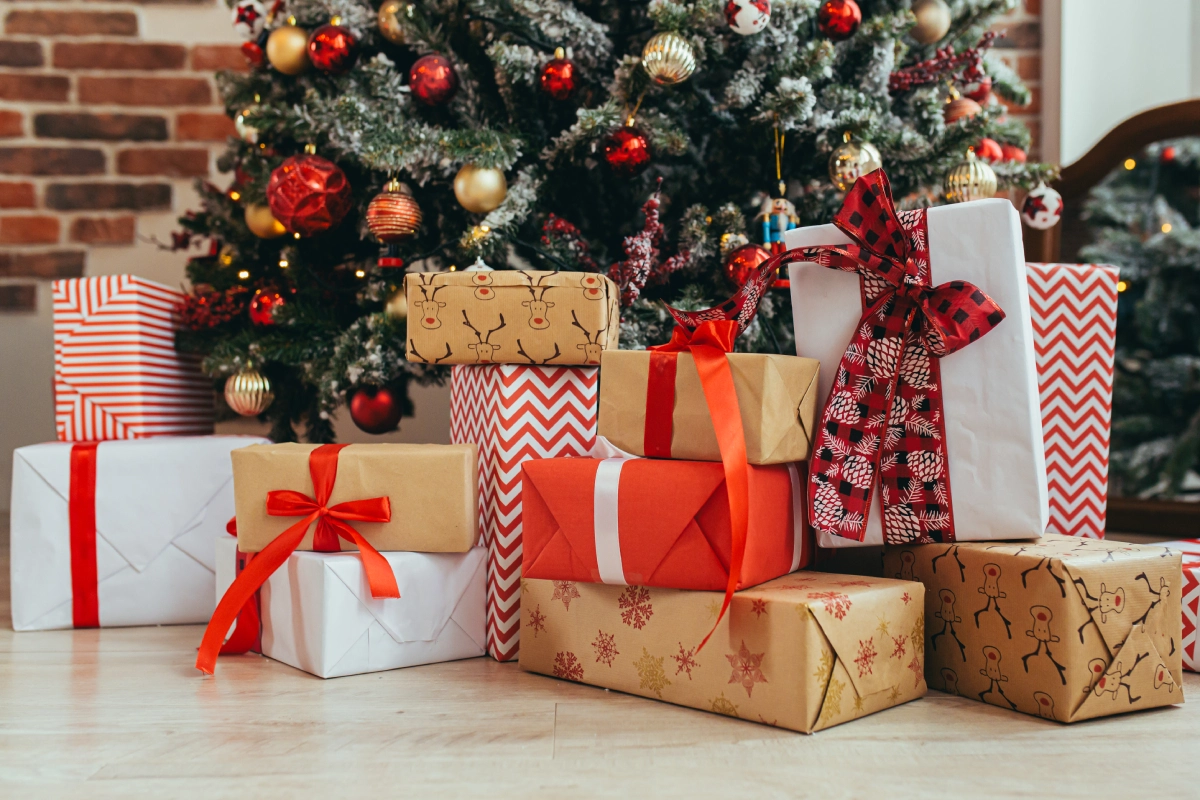 Christmas presents under decorated tree